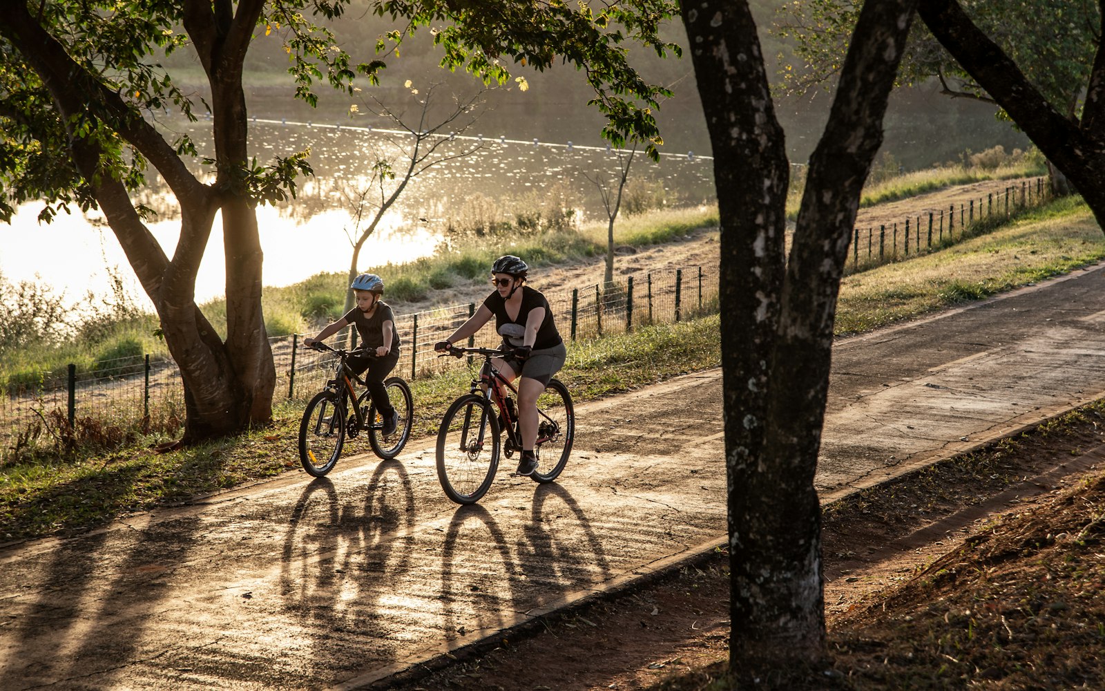A couple biking outdoors together